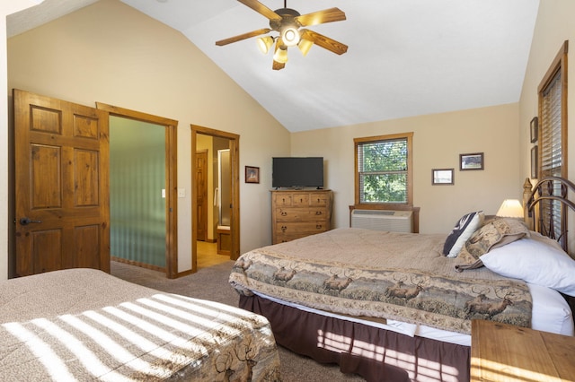 carpeted bedroom with ensuite bathroom, ceiling fan, vaulted ceiling, and a wall mounted AC