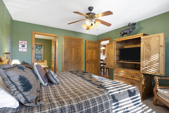 bedroom featuring ceiling fan and carpet floors