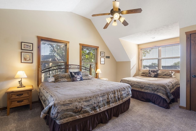 bedroom featuring multiple windows, ceiling fan, and carpet