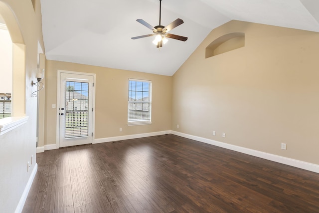 unfurnished room with dark hardwood / wood-style floors, high vaulted ceiling, and ceiling fan