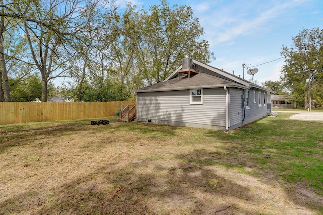 view of home's exterior featuring a lawn