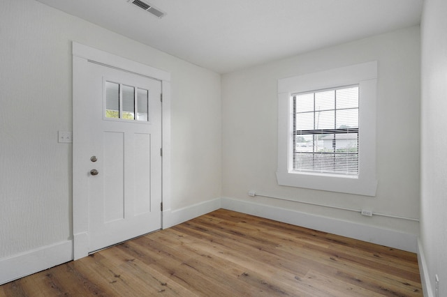 entrance foyer featuring light hardwood / wood-style floors