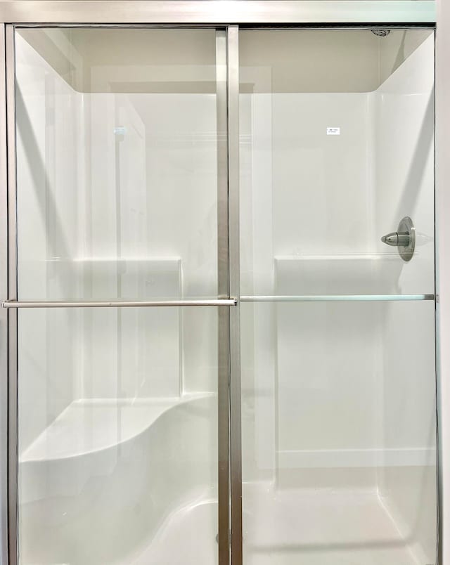 bathroom featuring walk in shower