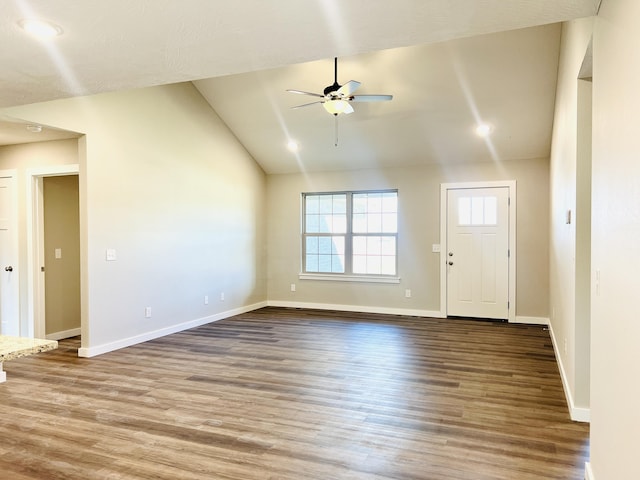 502 James, Billings, MO 65610 - unfurnished living room featuring lofted ceiling, a ceiling fan, baseboards, and wood finished floors