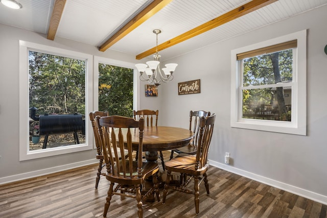 dining area featuring a notable chandelier, wood finished floors, beam ceiling, and baseboards