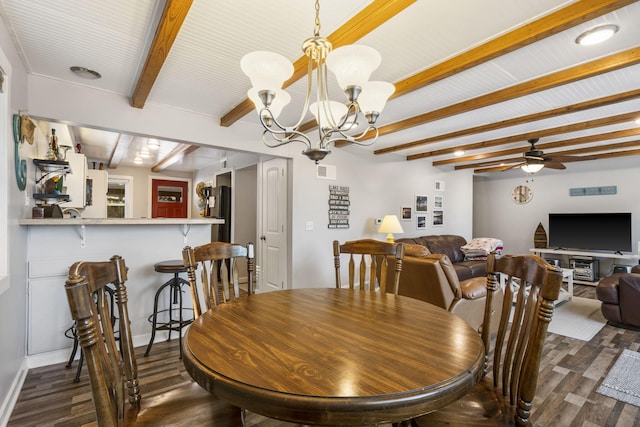 dining space featuring dark wood-type flooring, beam ceiling, visible vents, and ceiling fan with notable chandelier