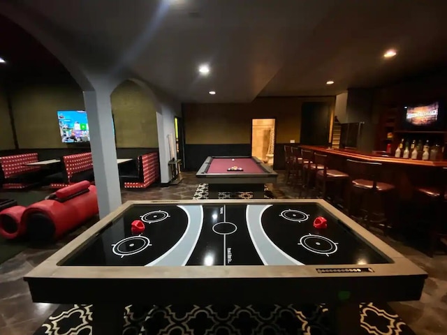 rec room with billiards and bar area