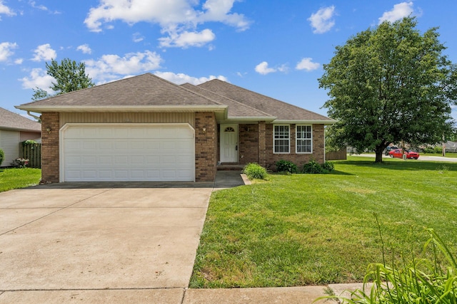1006 Care Ave, Nixa, MO 65714 - single story home with an attached garage, a front yard, driveway, brick siding, and roof with shingles