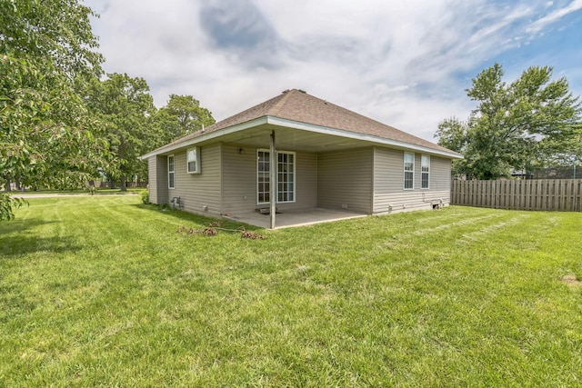 1006 Care Ave, Nixa, MO 65714 - back of property with a patio area and roof with shingles