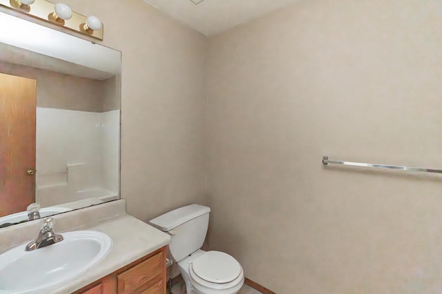 1006 Care Ave, Nixa, MO 65714 - bathroom with vanity, toilet, and a shower