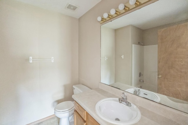 1006 Care Ave, Nixa, MO 65714 - full bath with toilet, vanity, and bathing tub / shower combination