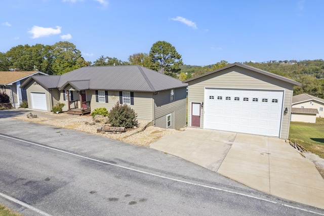 single story home featuring a garage