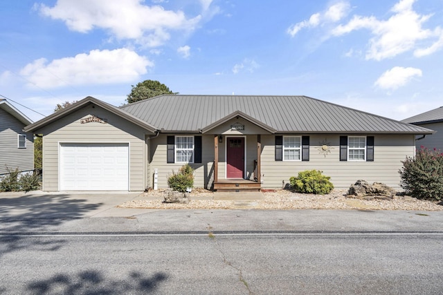 ranch-style home featuring a garage