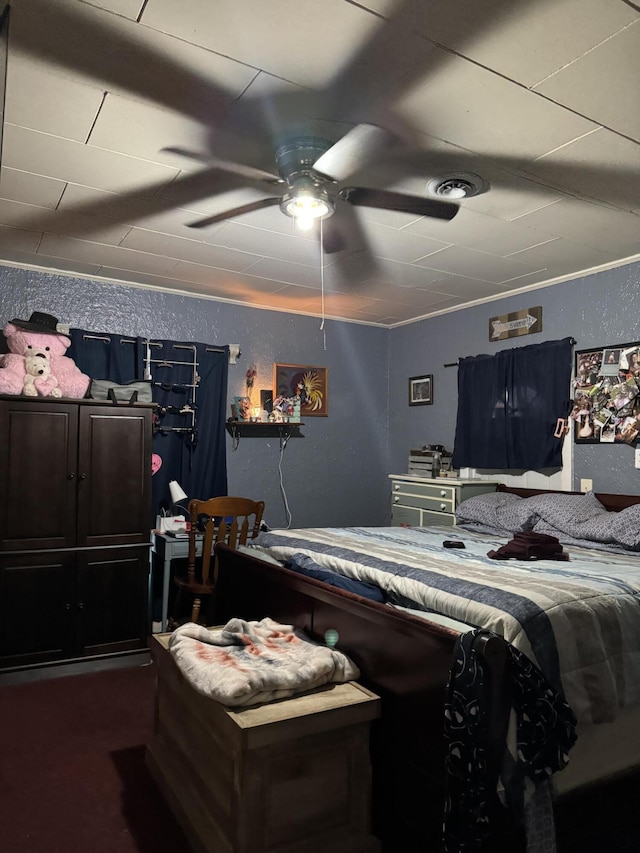 10603 N Main St, Butterfield, MO 65625 - bedroom featuring a textured wall, visible vents, and a ceiling fan