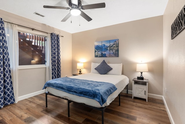 bedroom featuring ceiling fan and wood-type flooring