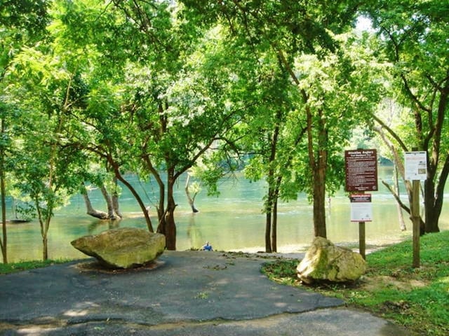 view of community with a water view