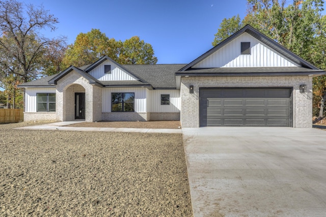 view of front of property featuring a garage