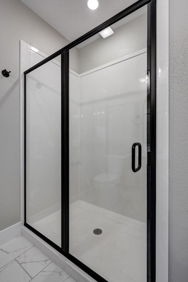 bathroom with walk in shower