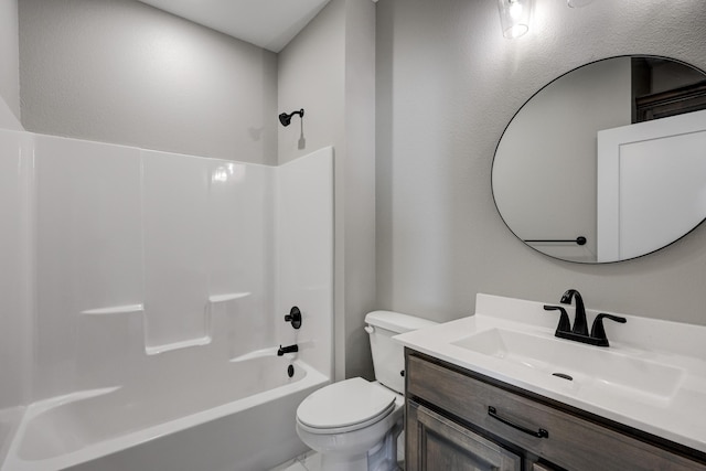 full bathroom featuring vanity, tub / shower combination, and toilet