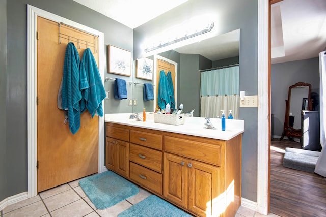 bathroom featuring hardwood / wood-style floors and vanity