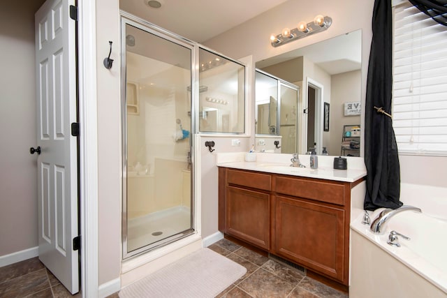 bathroom featuring tile patterned flooring, vanity, and independent shower and bath