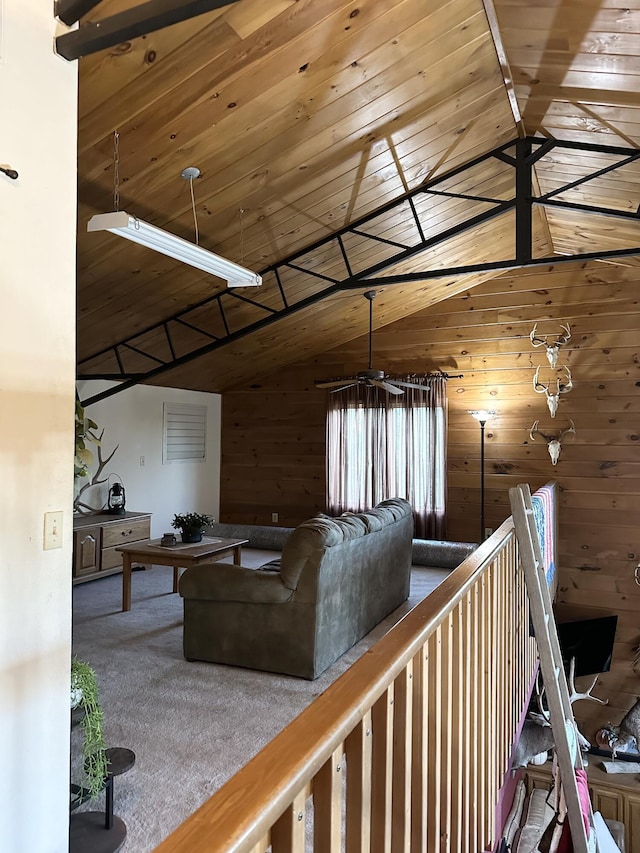 7020 N Farm Road 69, Walnut Grove, MO 65770 - living area featuring wooden walls, vaulted ceiling, carpet floors, and wooden ceiling