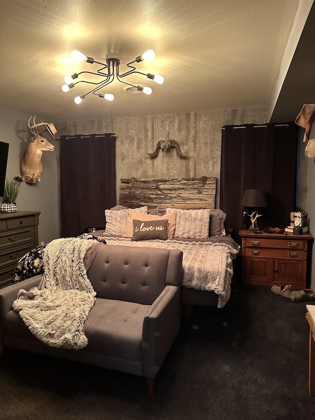 7020 N Farm Road 69, Walnut Grove, MO 65770 - bedroom with dark colored carpet, a textured ceiling, and a notable chandelier