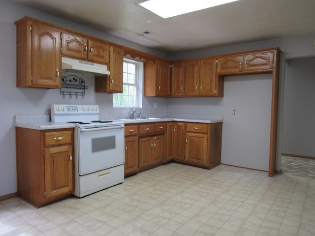 kitchen with sink and white electric stove