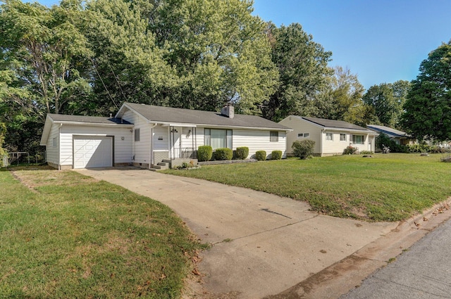 single story home featuring a front lawn and a garage