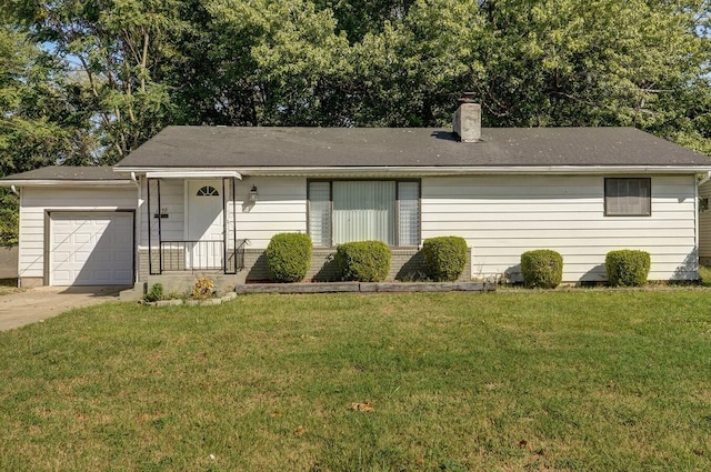 ranch-style home with a front lawn and a garage