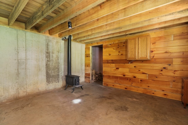 basement featuring a wood stove