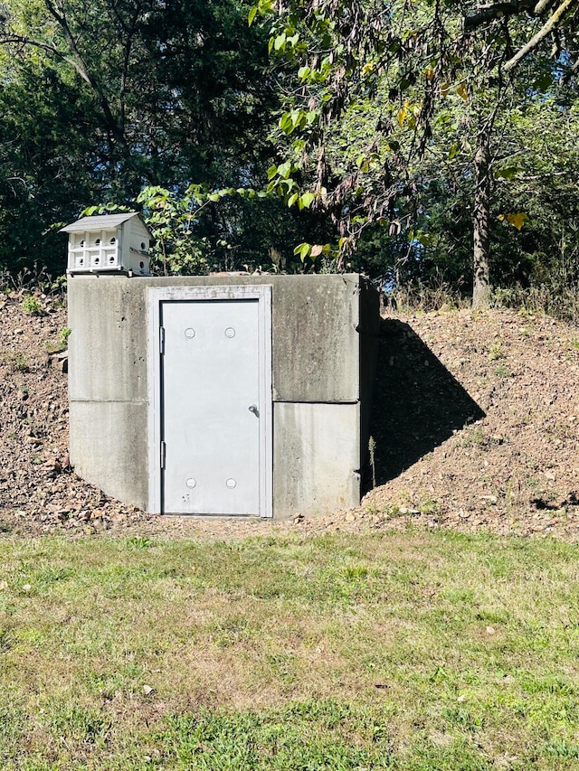 view of entry to storm shelter