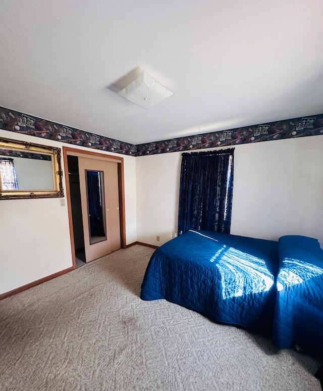 bedroom featuring carpet