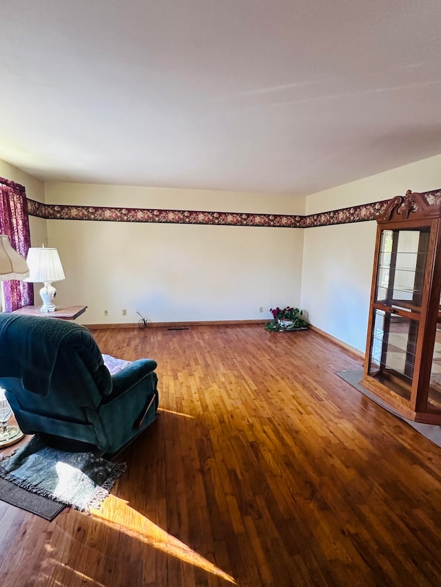 living room with hardwood / wood-style flooring