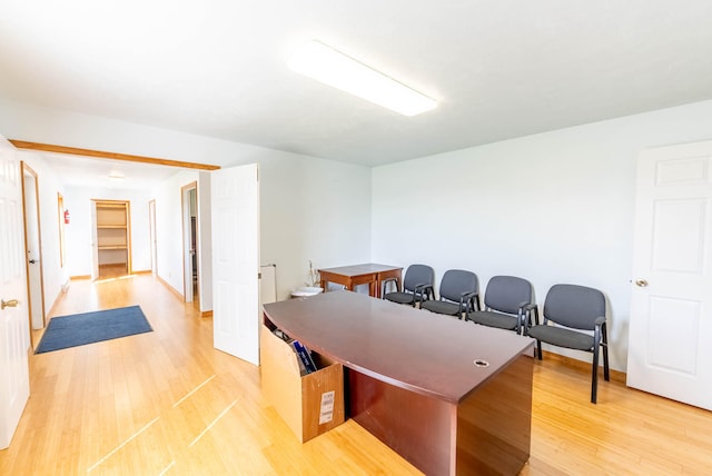 home office featuring light hardwood / wood-style floors