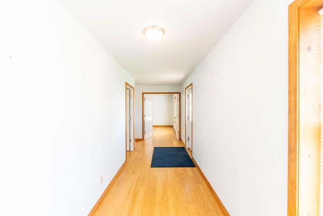 hallway featuring light hardwood / wood-style floors