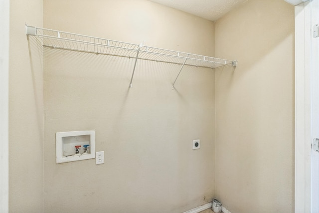 clothes washing area featuring washer hookup and electric dryer hookup