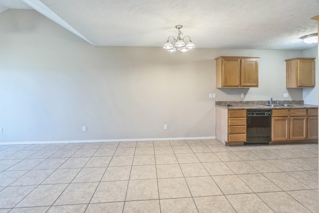 kitchen with dishwasher, sink, a chandelier, light tile patterned floors, and a textured ceiling