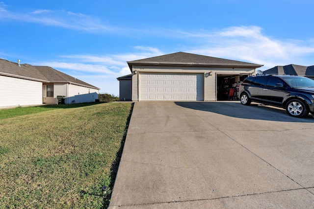 view of property exterior featuring a lawn and a garage