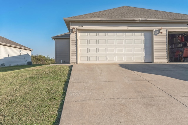 garage with a yard