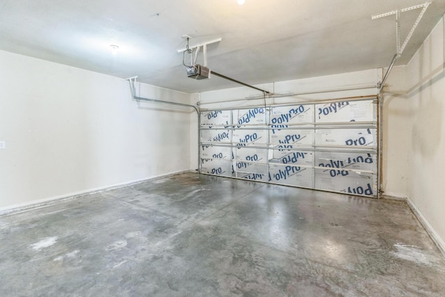 330 W Summit St, Aurora, MO 65605 - garage featuring a garage door opener