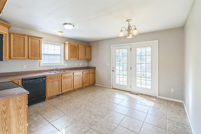 kitchen featuring a chandelier, black dishwasher, sink, hanging light fixtures, and light tile patterned floors