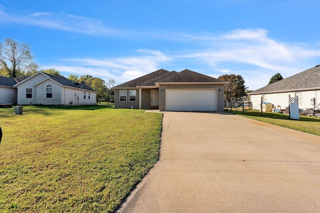 ranch-style home featuring a front lawn and a garage