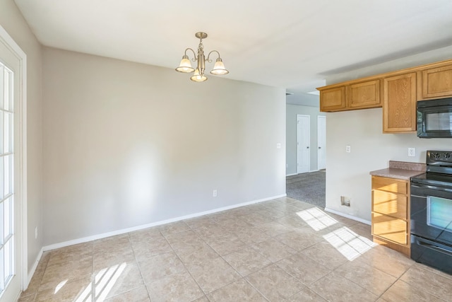 330 W Summit St, Aurora, MO 65605 - kitchen with plenty of natural light, baseboards, a chandelier, and black appliances
