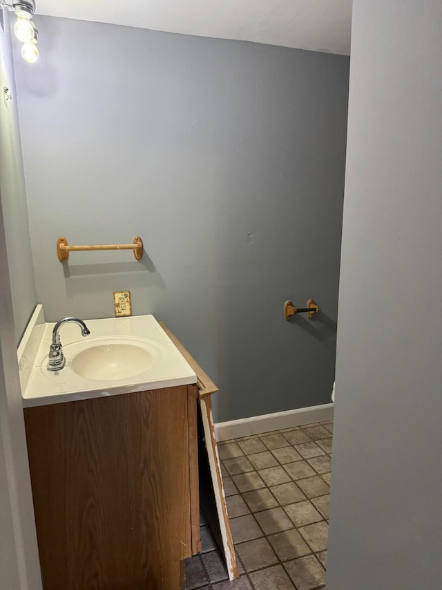 bathroom with sink and tile patterned floors