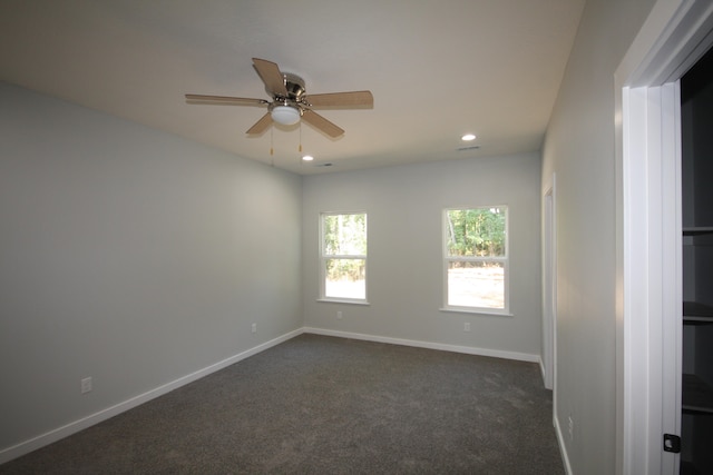 carpeted empty room with ceiling fan