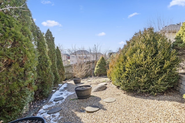 view of yard featuring fence