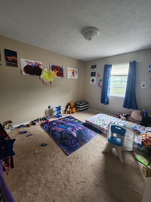 carpeted bedroom with a textured ceiling