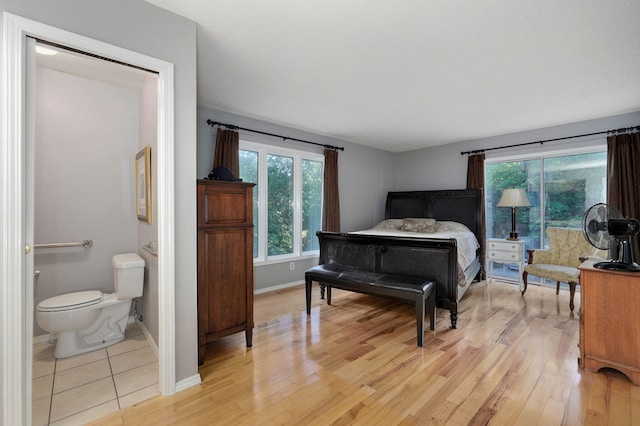 bedroom with light hardwood / wood-style flooring