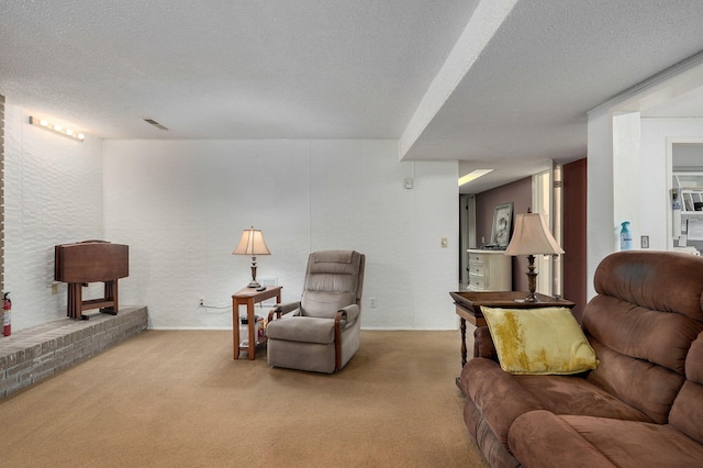 living room with carpet and a textured ceiling